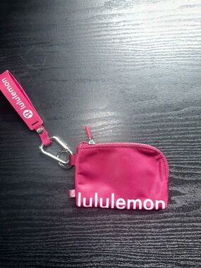 Lululemon Pink Mini Zip Coin Pouch with Carabiner (Dark Red / Purple Hue)